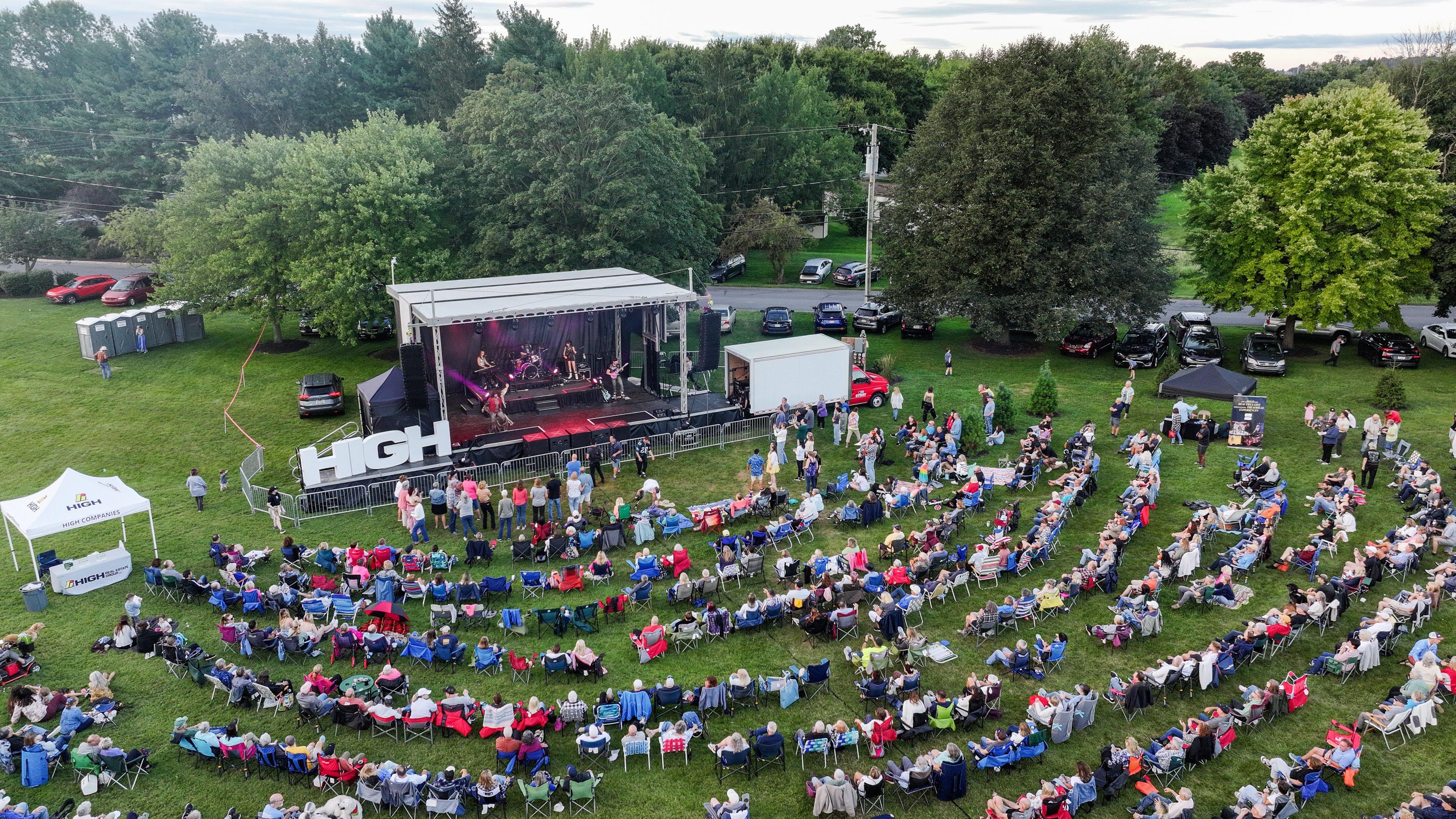 Photo of crowd and stage at the 2025 August Concert at Greenfield